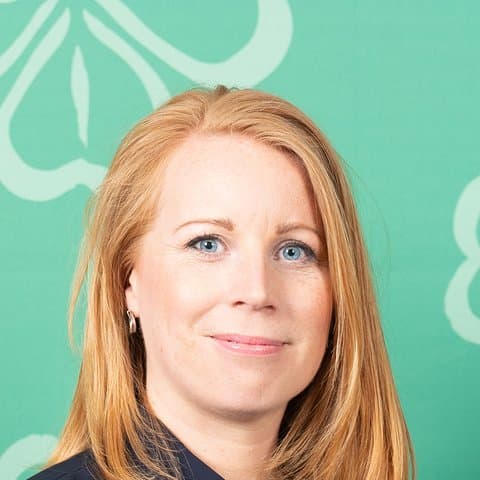 Annie Lööf, cropped to the head; a little green backdrop remains
